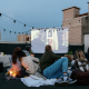 friends watching a movie - How to Socialize Without Alcohol